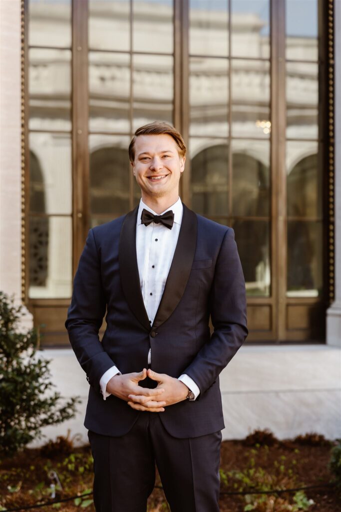happy groom during their intimate wedding ceremony