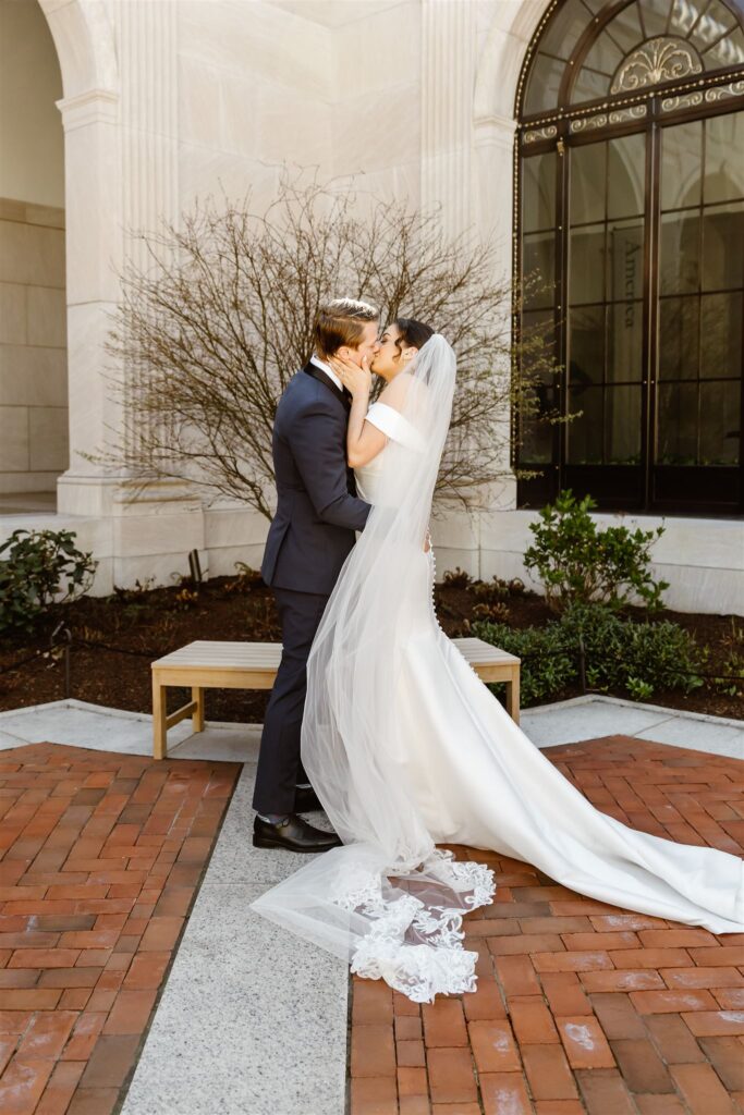 bride and groom first kiss 