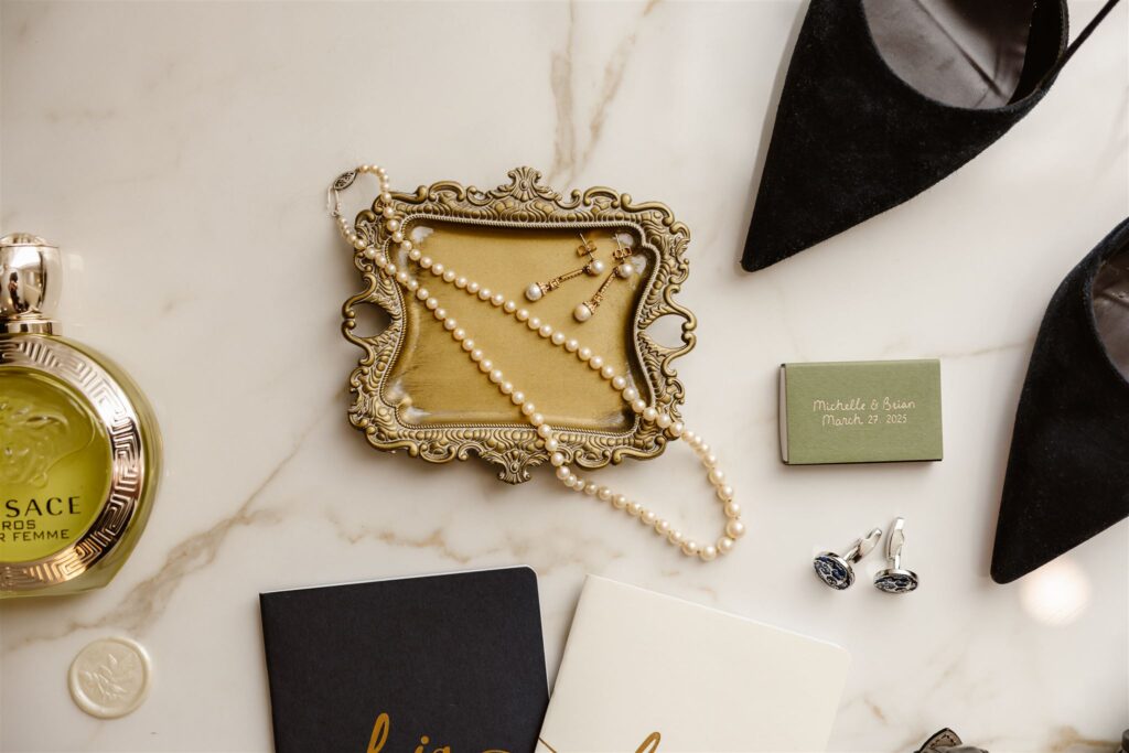 elegant detail flatlay on a marble floor