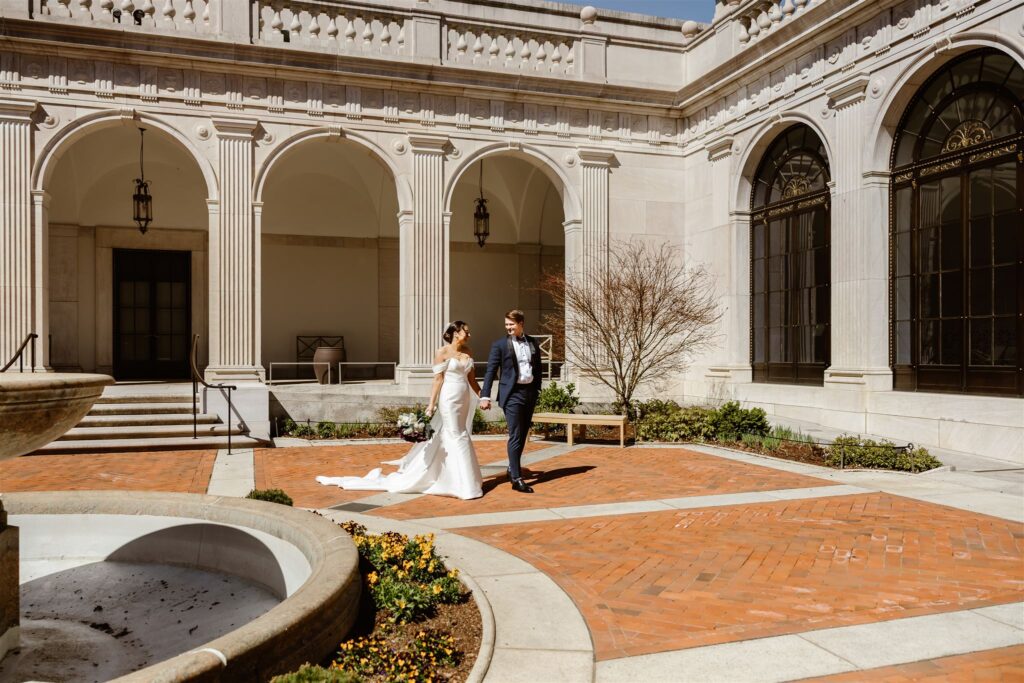 bride and groom exploring the grounds of freer gallery of art