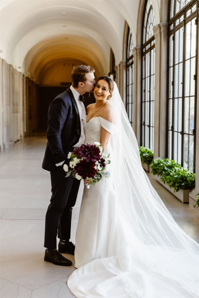 elegant bride and groom posing at the art museum during their dc micro wedding