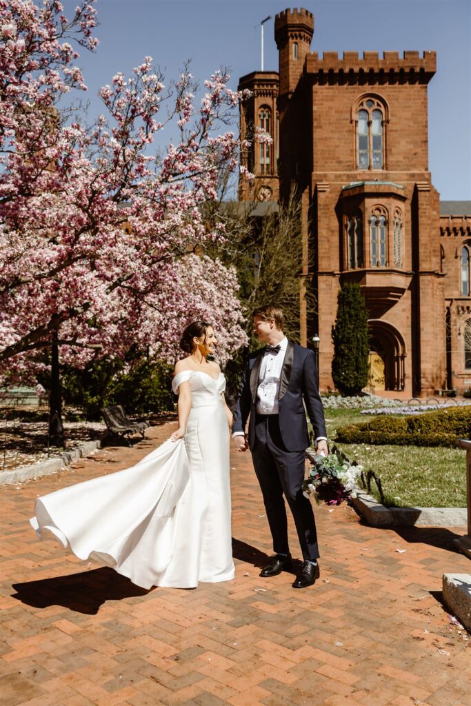 bride and groom at the smithsonian castle garden
