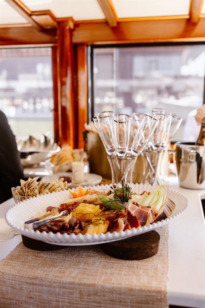 elegant snacks and drinks set up on a yacht