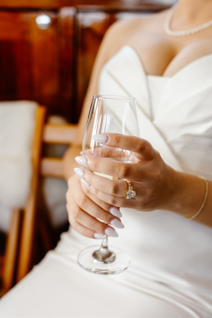 bride holding a champagne glass