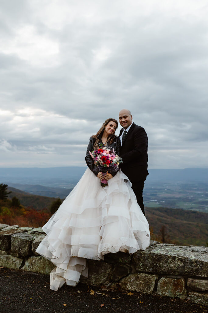 bride and groom during blue hour at a foggy overlook in shenandoah national park