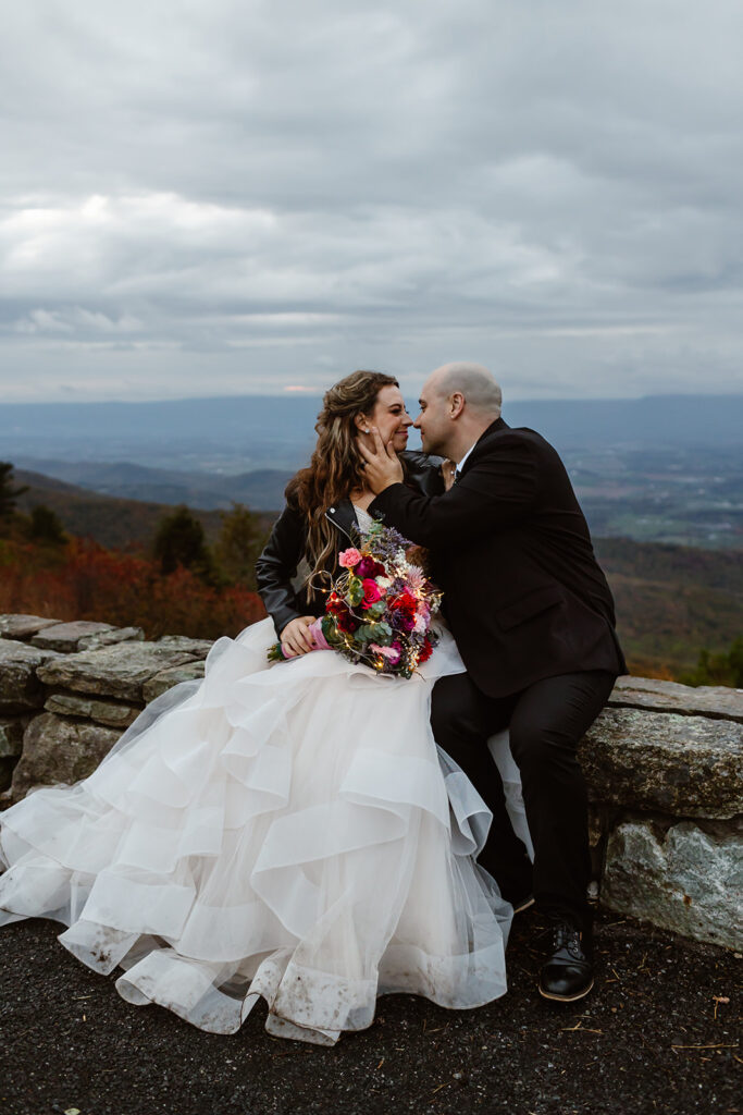 bride and groom during blue hour at a foggy overlook in shenandoah national park