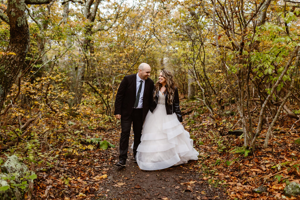 bride and groom hiking a trail during their shenandoah elopement