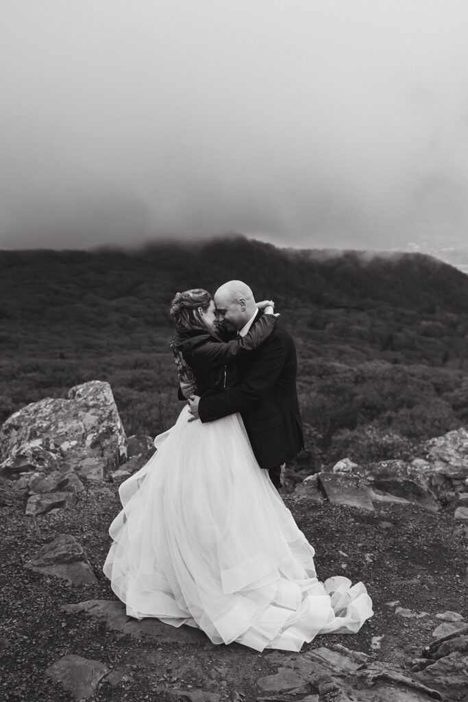 bride and groom first dance surrounded by fall foliage in shenandoah