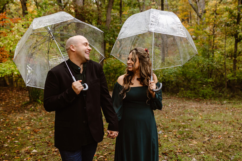 sweet couple under a clear umbrella during their session in Shenandoah National Park