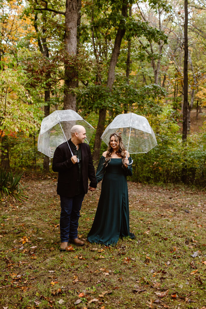 sweet couple under a clear umbrella during their session in Shenandoah National Park