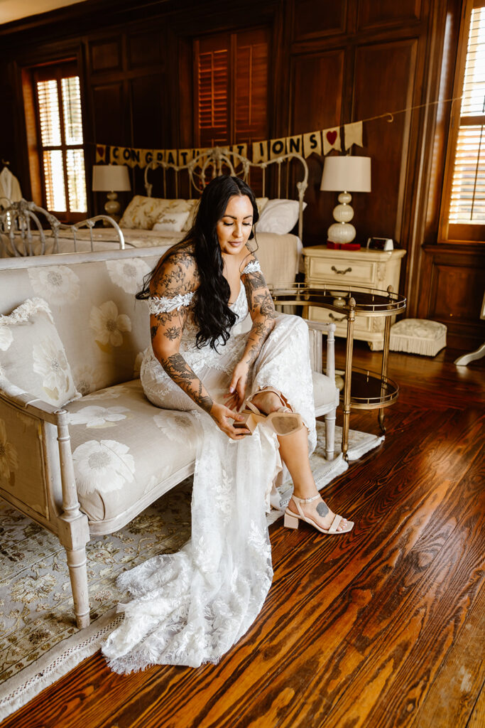 bride putting on her shoes