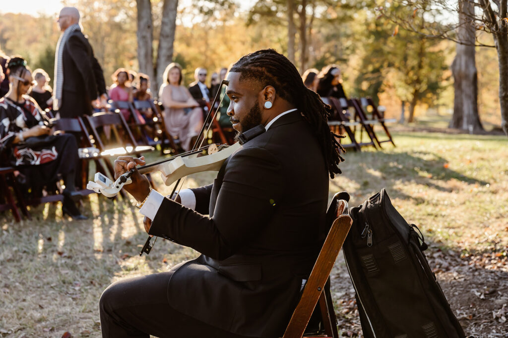 violinist playing for the micro wedding ceremony