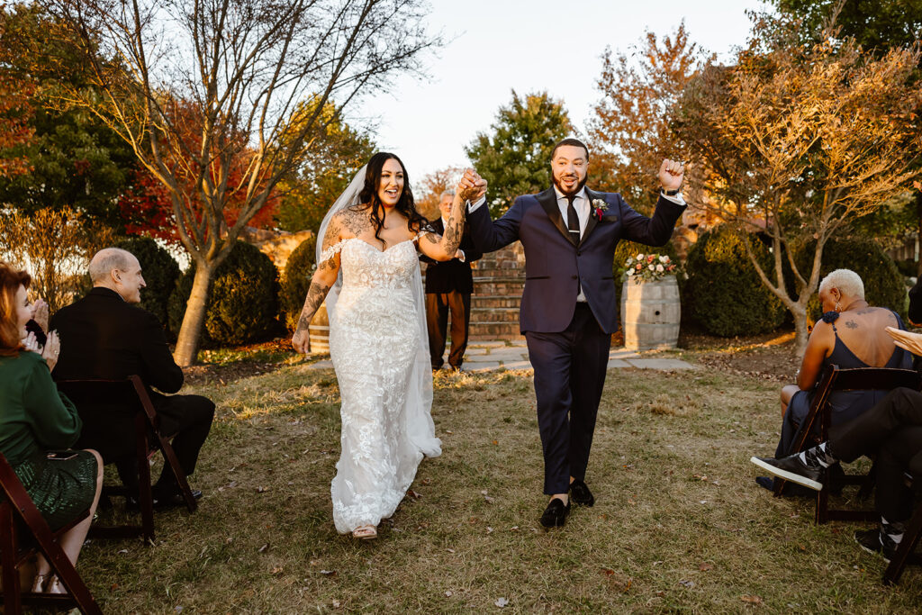 excited bride and groom exit from their wedding ceremony