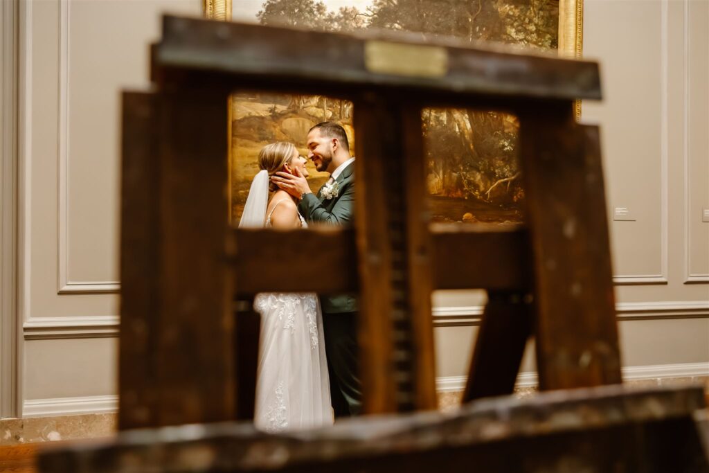 romantic elopement couple looking at the art inside the national gallery of art