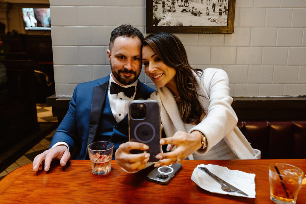 bride and groom enjoying a meal in the city during the dc elopement