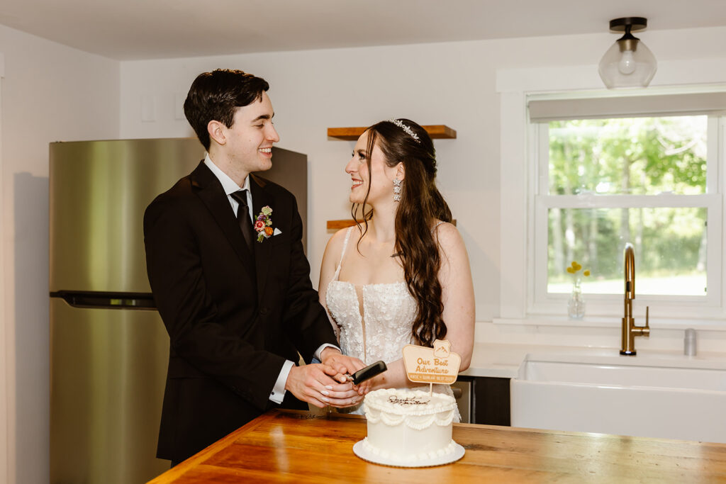 bride and groom cutting a small elopement cake