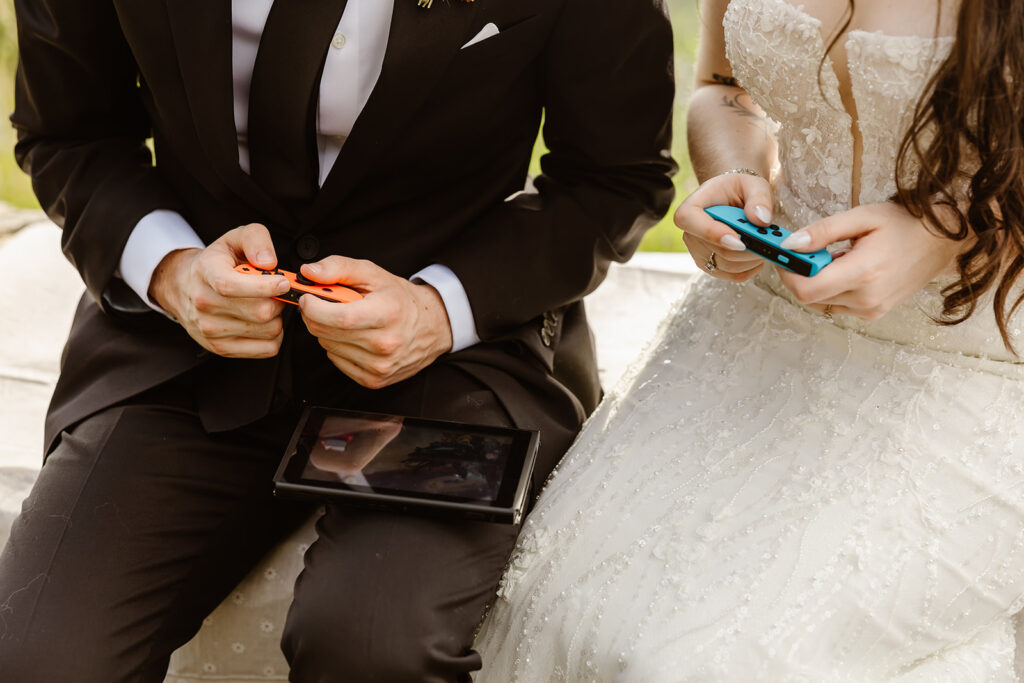 bride and groom playing a video game together