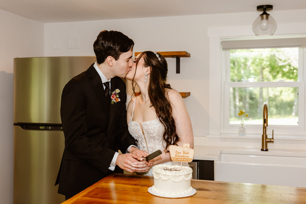bride and groom cutting cake at the airbnb