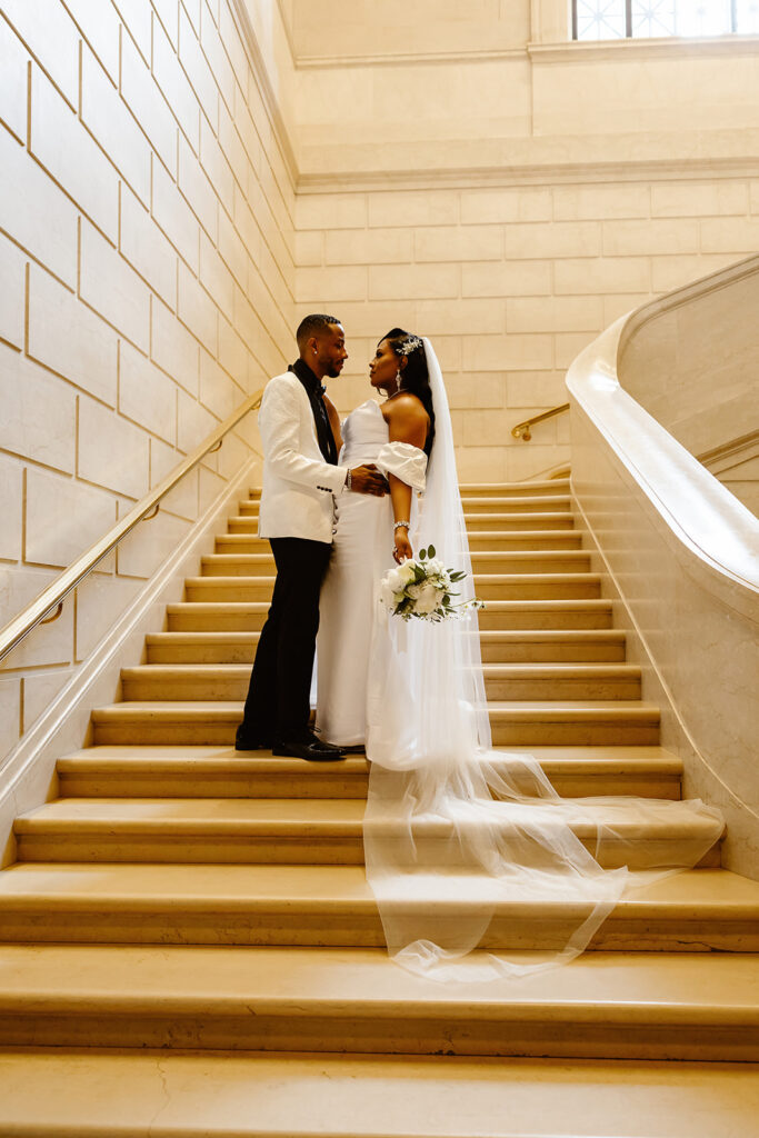 bride and groom on the steps at the national gallery of art