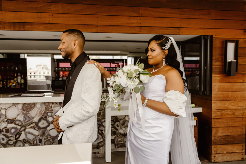 bride and groom first look at the hotel