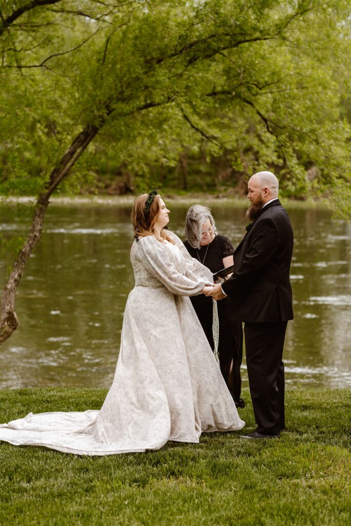 modern viking wedding elopement ceremony at the shenandoah river with hand fasting ritual 