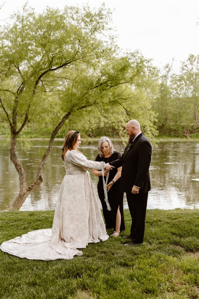 modern viking wedding elopement ceremony at the shenandoah river with hand fasting ritual 