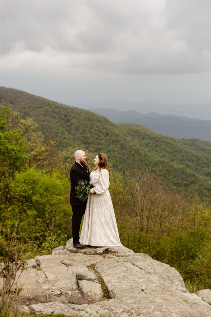 adventurous bride and groom during their summer mountain elopement in shenandoah national park
