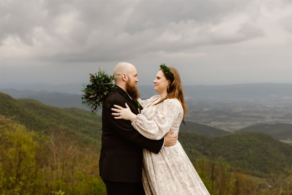 adventurous bride and groom during their summer mountain elopement in shenandoah national park