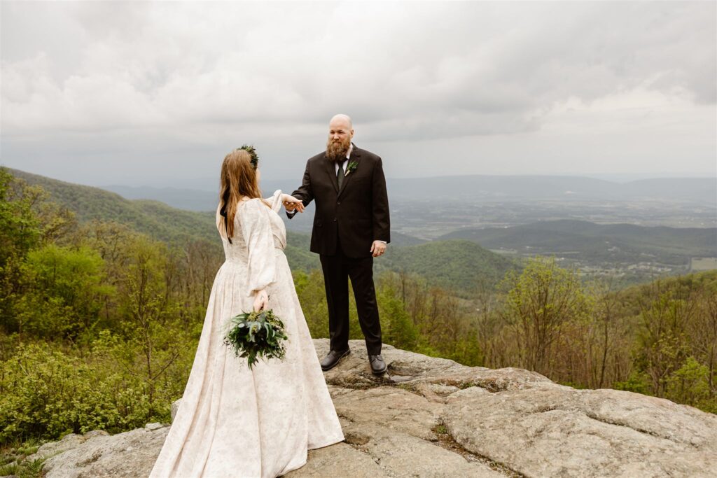 adventurous bride and groom during their summer mountain elopement in shenandoah national park
