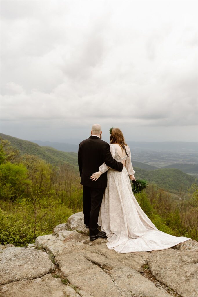 adventurous bride and groom during their summer mountain elopement in shenandoah national park