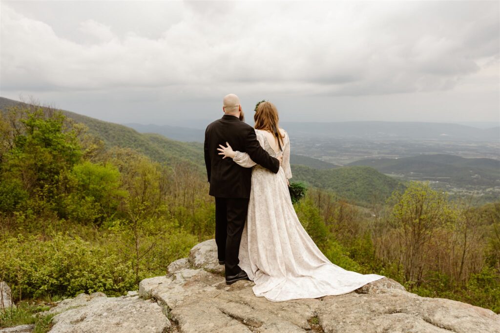 adventurous bride and groom during their summer mountain elopement in shenandoah national park
