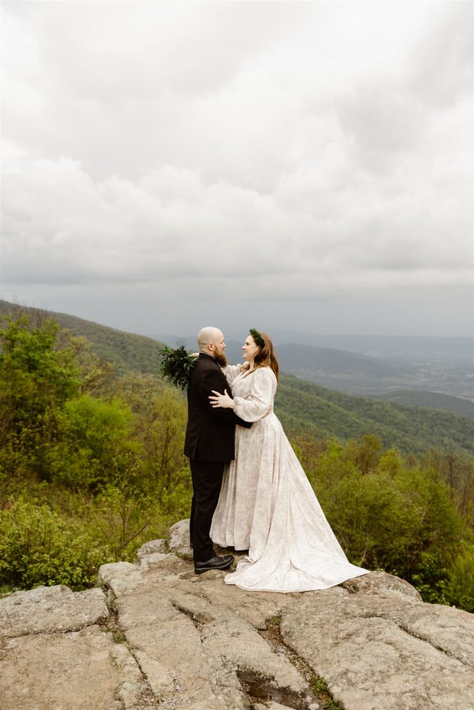 adventurous bride and groom during their summer mountain elopement in shenandoah national park