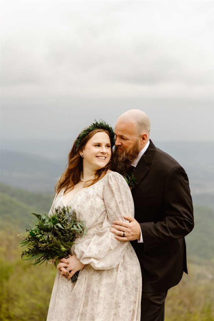 adventurous bride and groom during their summer mountain elopement in shenandoah national park