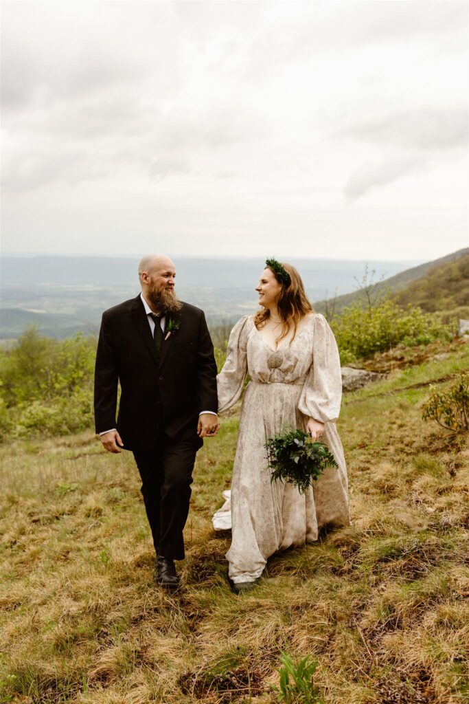 adventurous bride and groom during their summer mountain elopement in shenandoah national park