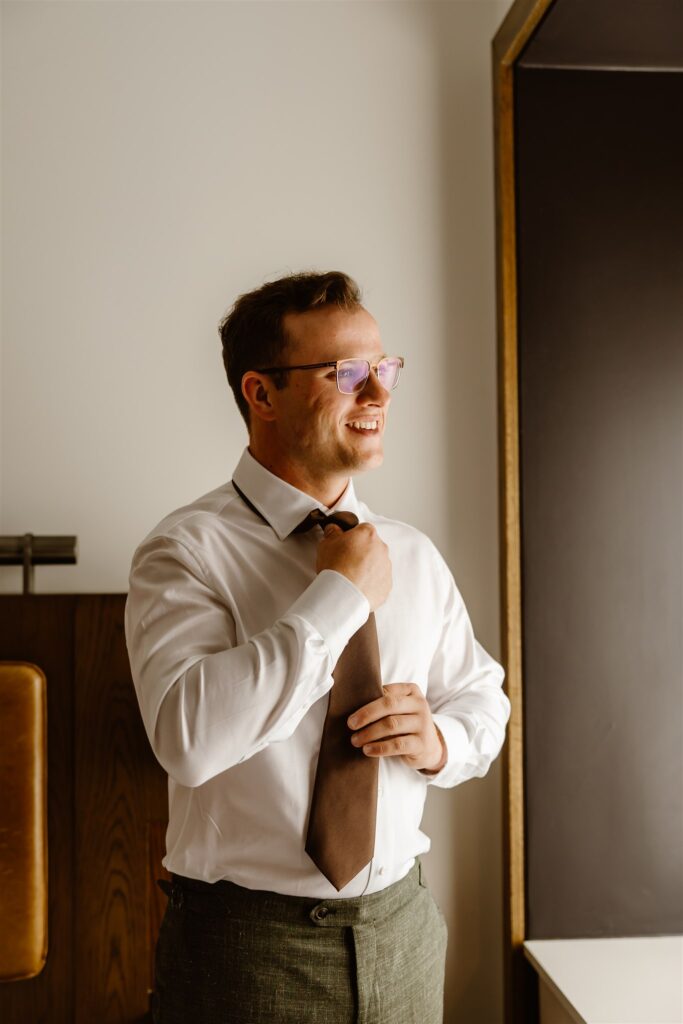 groom getting ready at the hotel