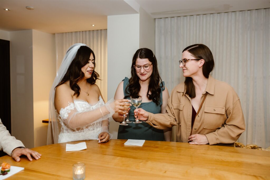 bride and groom hanging out with the guests at lyle hotel and restaurant during their dc micro wedding