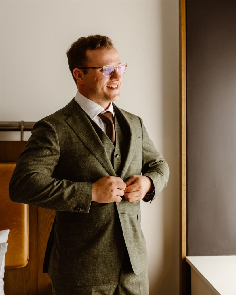 groom getting ready at the hotel