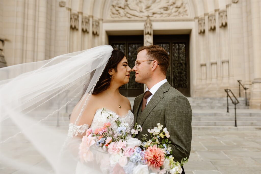 romantic bride and groom moments during their dc cherry blossom wedding at the national cathedral