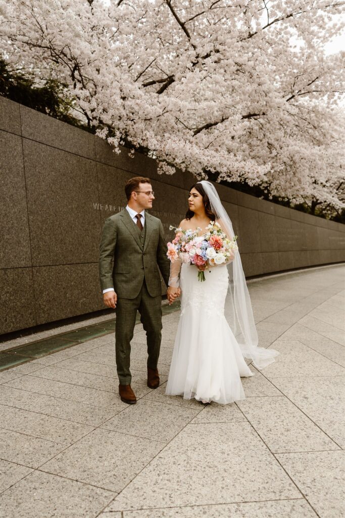 spring elopement in washington dc during cherry blossom season at tidal basin