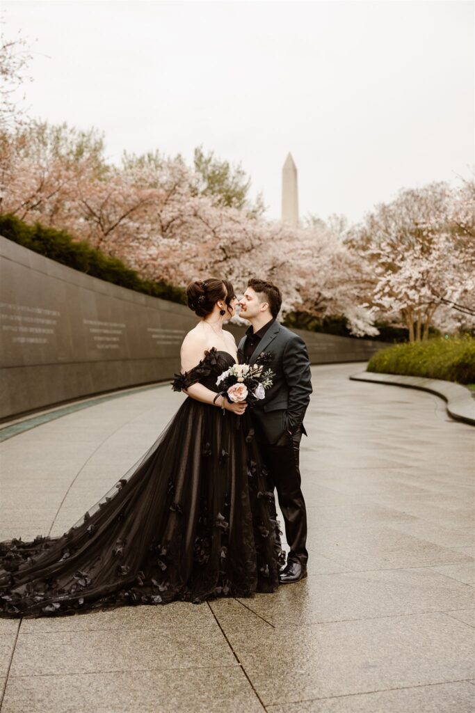 gothic elopement in washington dc during cherry blossom season at tidal basin