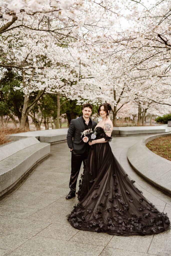 gothic elopement in washington dc during cherry blossom season at tidal basin