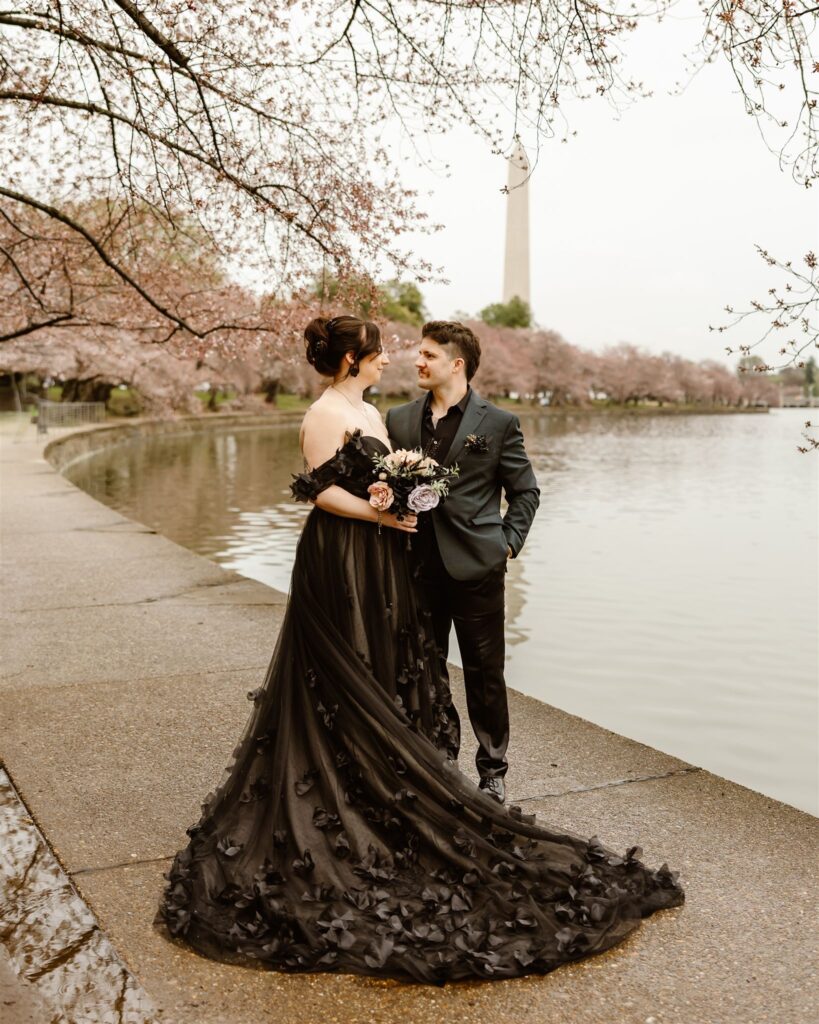 gothic elopement in washington dc during cherry blossom season at tidal basin