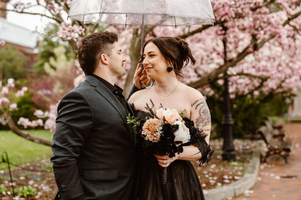 gothic elopement couple roaming the smithsonian castle gardens