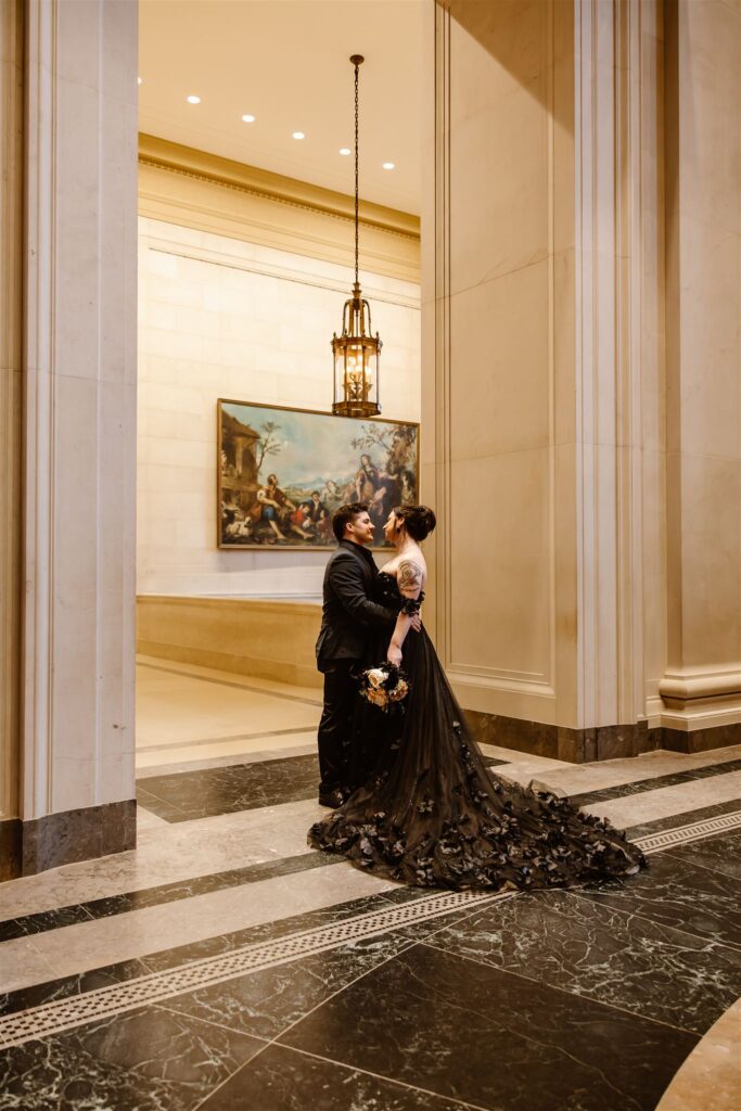 gothic elopement couple during their dc elopement at the national gallery of art