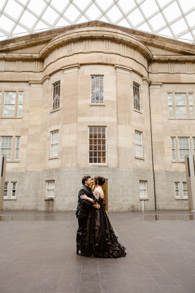 gothic elopement bride and groom at the national portrait gallery courtyard