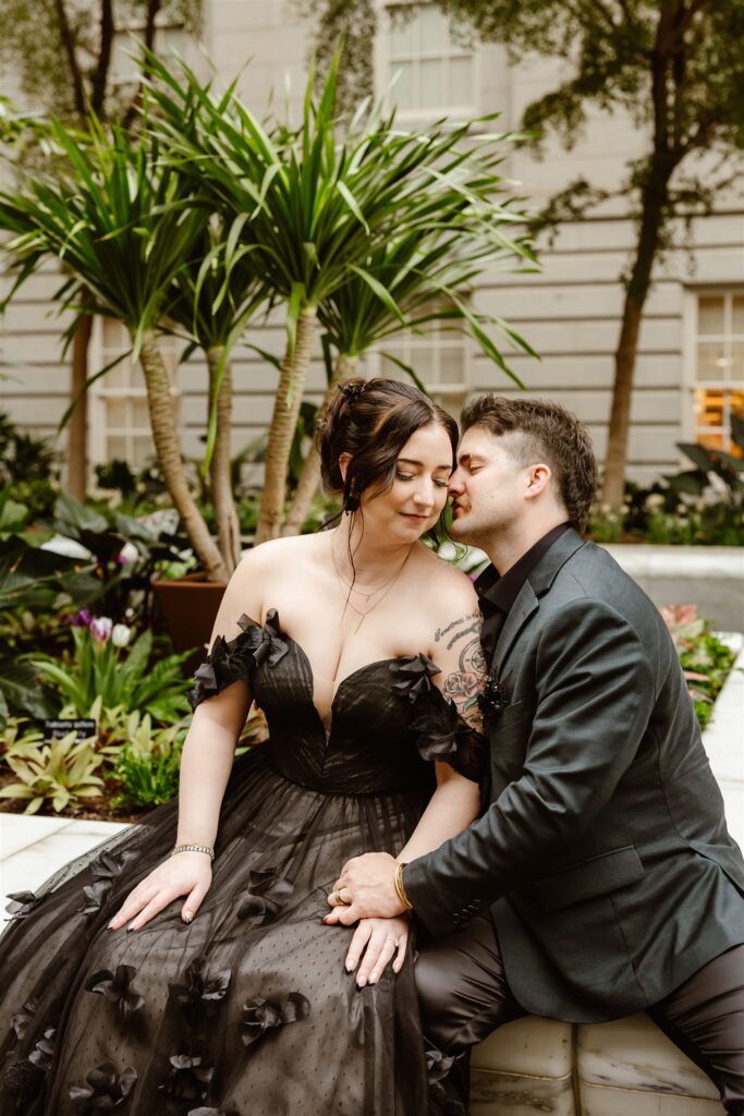 gothic elopement bride and groom at the national portrait gallery courtyard