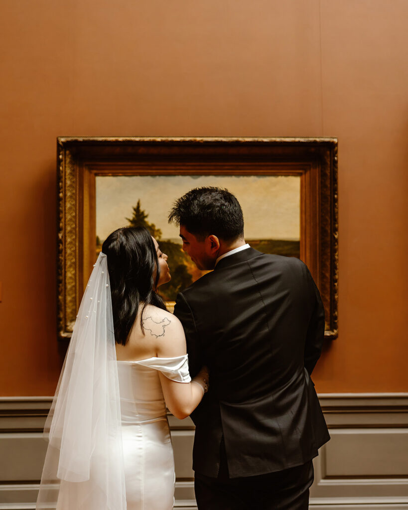 playful and romantic elopement couple moments at the national gallery of art in dc