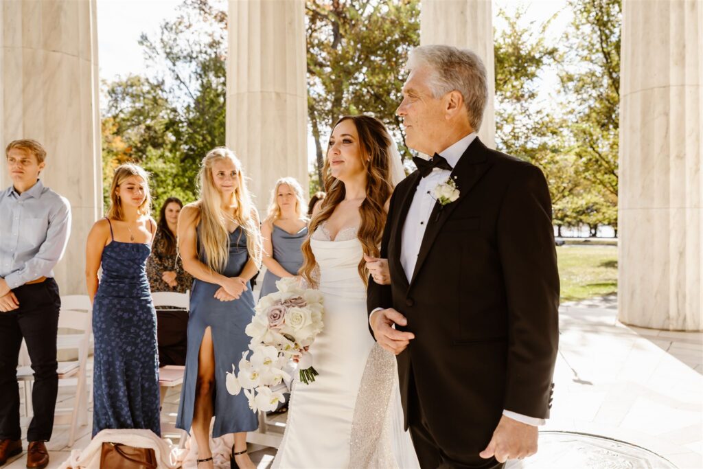 dad walking bride down the aisle at dc war memorial