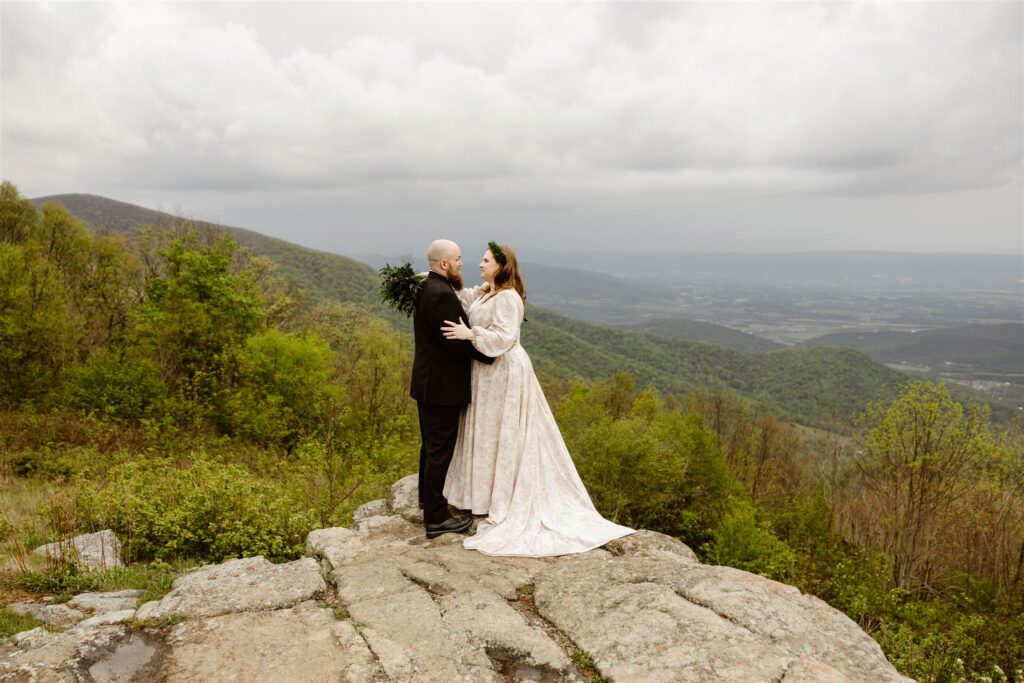 bride and groom exploring shenandoah national park during their two day elopement adventure