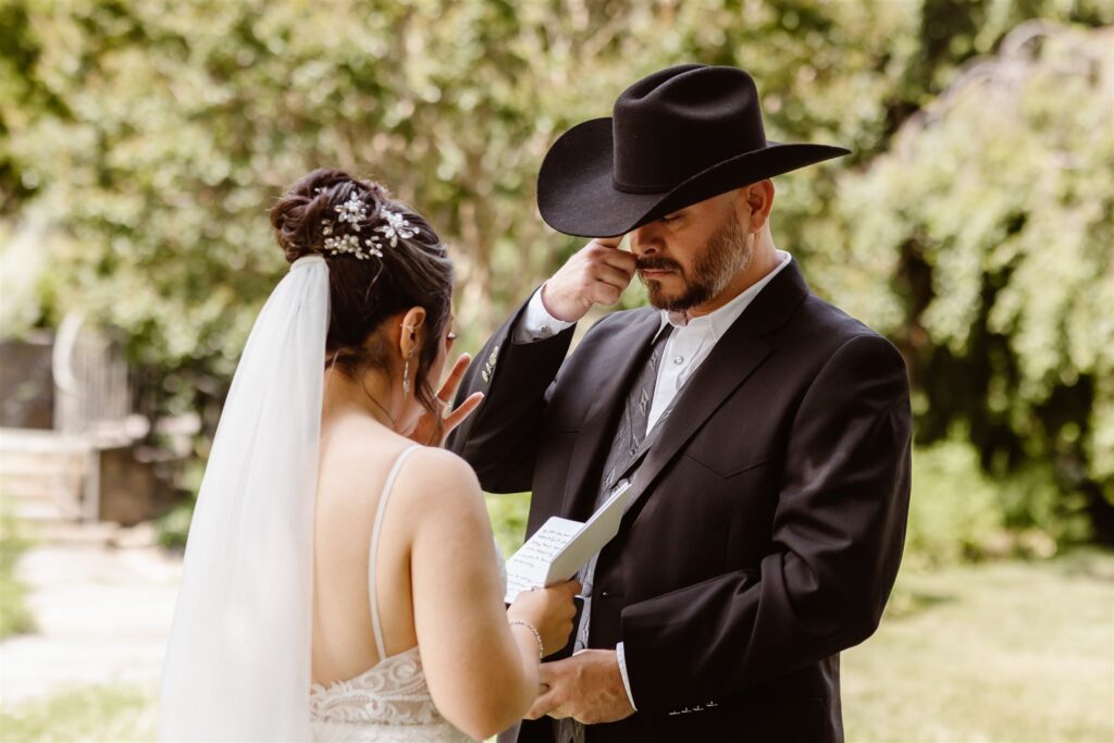candid elopement ceremony in front of the national cathedral in dc